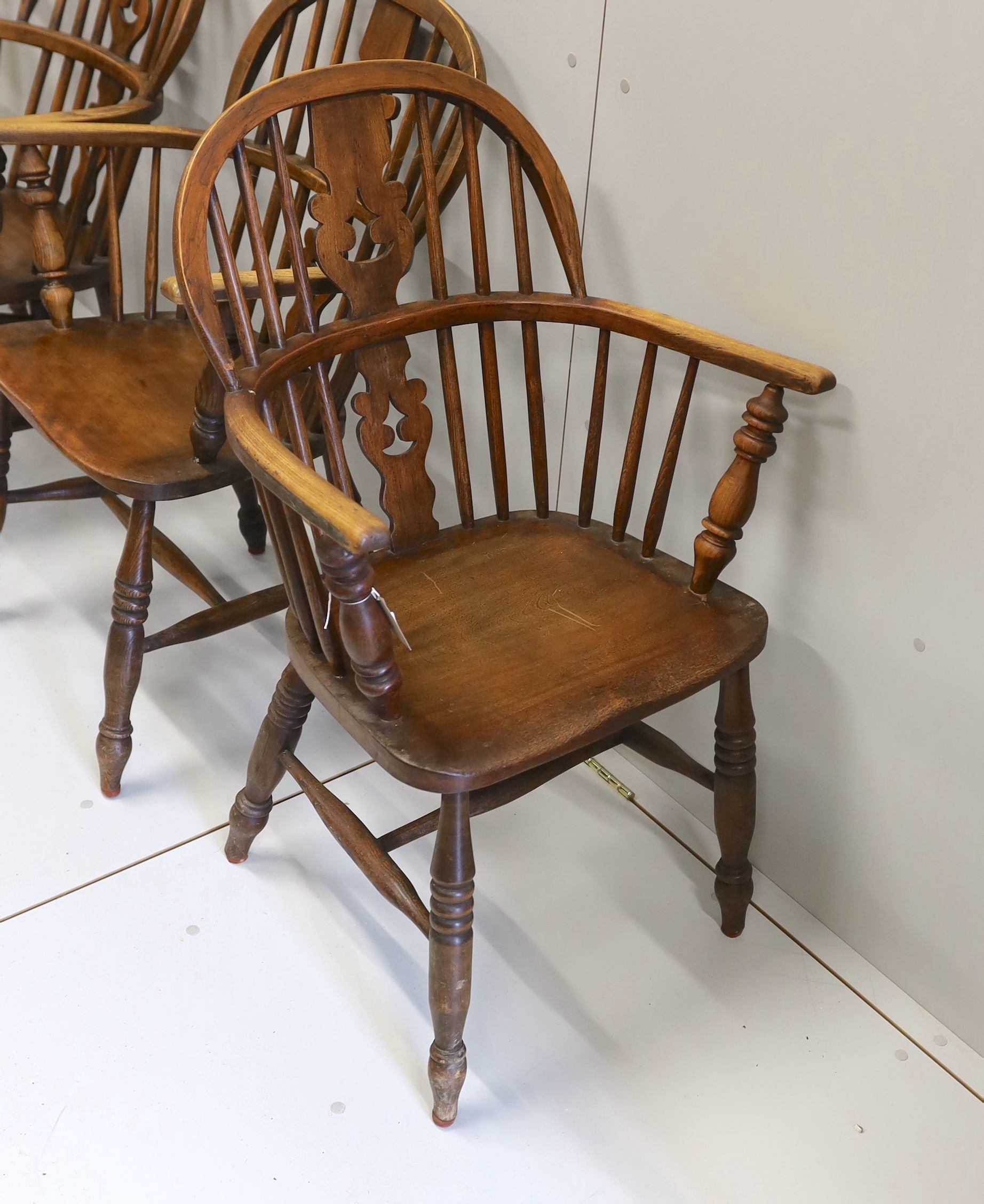 A near set of four 19th century Nottingham area elm, ash and beech Windsor elbow chairs, possibly by Allsop & Son, width 58cm, depth 39cm, height 94cm